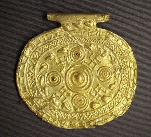Etruscan pendant with swastika symbols dating to 700-500 BCE in Bolsena, Italy